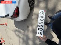 Фото автомобильного номера Е009СА 55
