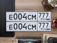 Фото автомобильного номера Е004СМ 777