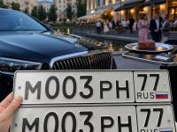 Фото автомобильного номера М003РН 77