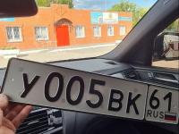 Фото автомобильного номера У005ВК 61